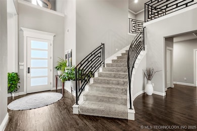 Stately Staircase with modern iron railing