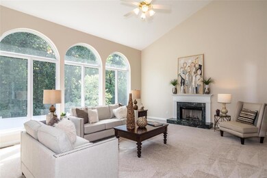 Great room with dramatic wall of windows.