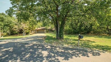 Obstructed view of property featuring a garage