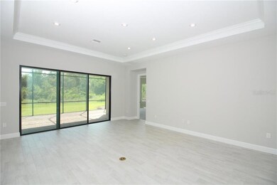 The large sliding glass doors at the Gathering area brings the outdoors in with views of your backyard oasis!