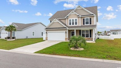 View of front of house featuring a front yard and 