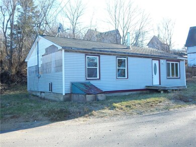 Front & Left, needs siding finished
