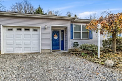 Double garage, gravel drive, & sizable ranch