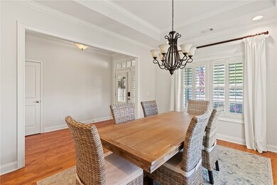 The formal dining room is adjacent to the foyer. A