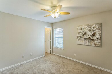 Bed 2 with walk-in closet.