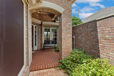 A leaded-glass door greets your
guests as they en