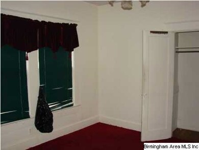 One of three large bedrooms