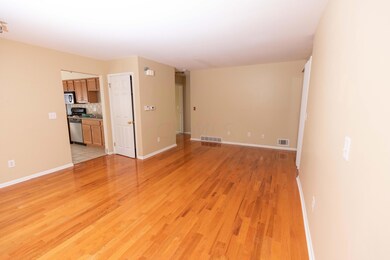 Living room w/ hardwood