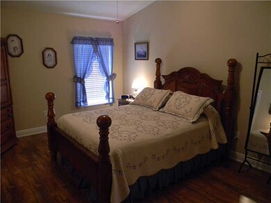 Master Bedroom. Hardwood flooring...