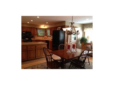 Large kitchen with eating and sitting area.