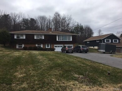 Spacious, flat driveway with a turn-around