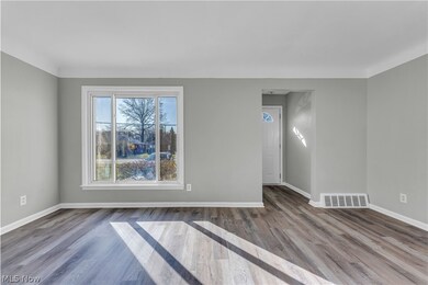 Unfurnished room with light hardwood / wood-style flooring