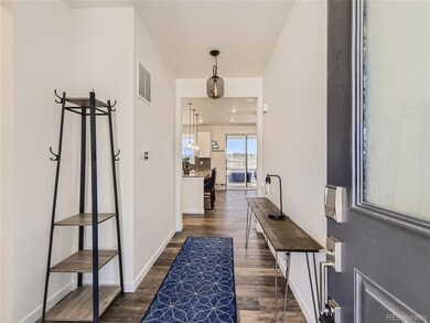 The entry foyer is an inviting entry into the home