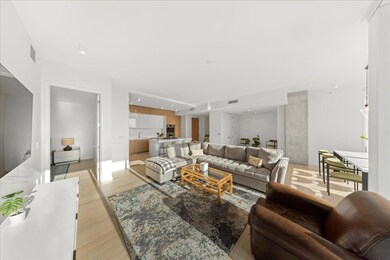 Living area with light wood-type flooring
