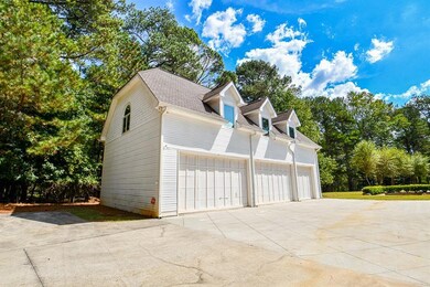 View of guest house/office and garages