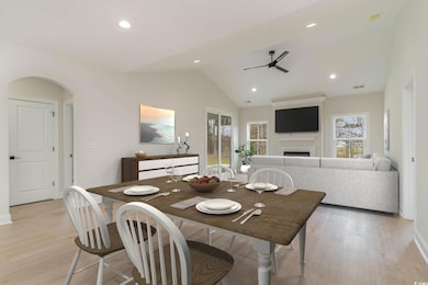 Dining room featuring light wood finished floors, 