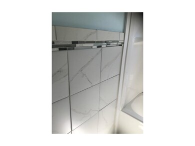 Beautiful tile next to the shower