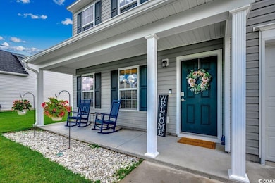 Property entrance with a porch