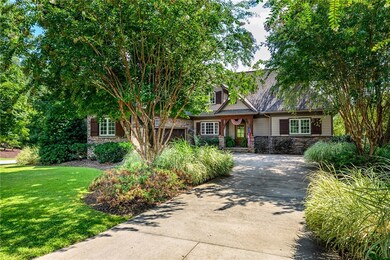 Recessed with lush front yard