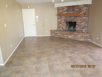 familyroom with brick fireplace