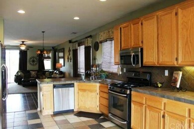 Kitchen opens up to dining area & living room.