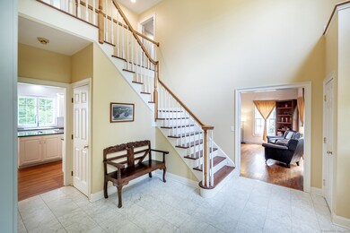 2 Story Entry Foyer with marble floors