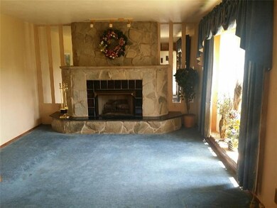 Livingroom with Custom Stone gas fireplace and Bla