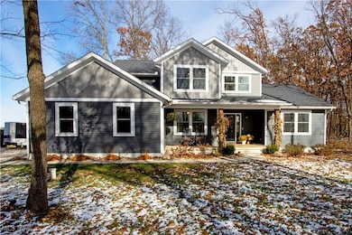 View of front of house featuring covered porch