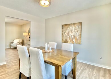 Spacious formal dining right off the kitchen is great for entertaining