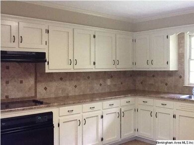 Tile back splash and nice appliances.