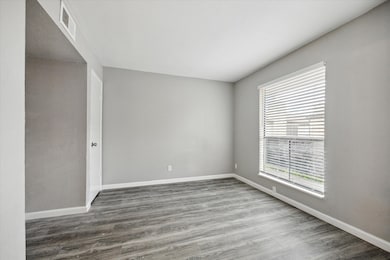 Second bedroom with closet and computer niche