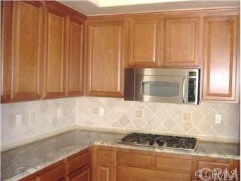 Kitchen w/ Microwave & Cooktop
