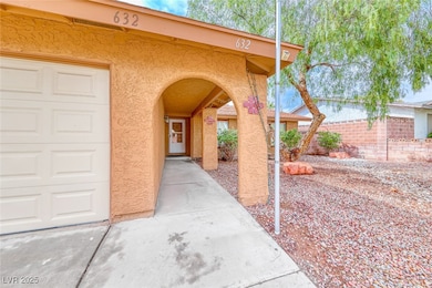 Doorway to property with stucco siding