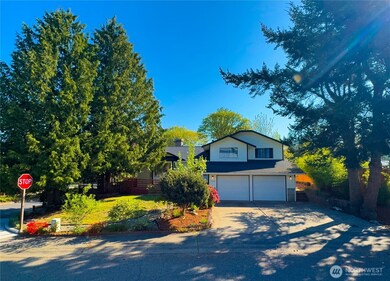 Beautifully remodeled home with fresh exterior paint on a corner lot.