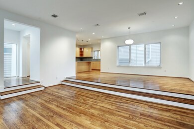 Step up to the dining area which has recessed ligh