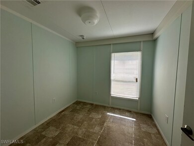 Spare room featuring tile patterned flooring