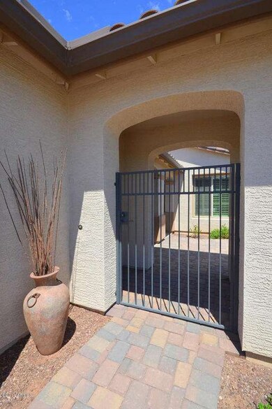 GATED ENTRY TO COURTYARD