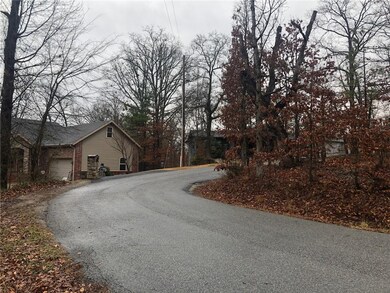 Standing in front of the lot looking t the left.