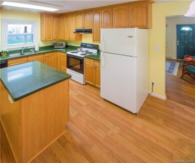 Kitchen features Silestone countertops...