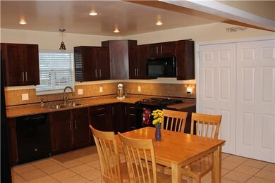 Welcome home to this amazing updated kitchen. Tile floors & backsplash, new stunning cabinets and appliances.