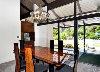 Formal dining room, has a bar and built in cabinet