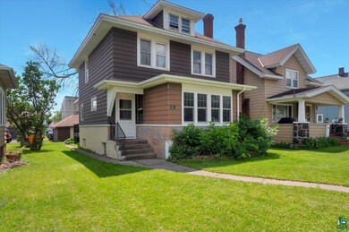 View of front of house with a front yard