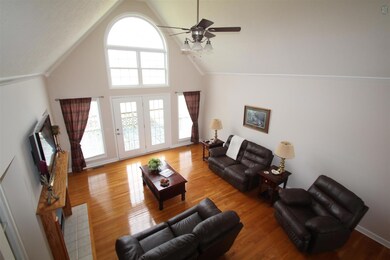 Soaring ceiling in living room. 