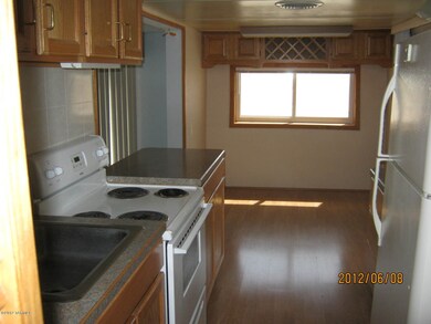 Showing dining area front kitchen area