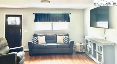 Living room offers ample natural light.