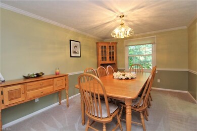 Dining Room with Chair and Crown Moldings