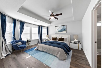 The primary bedroom is located at the back of the