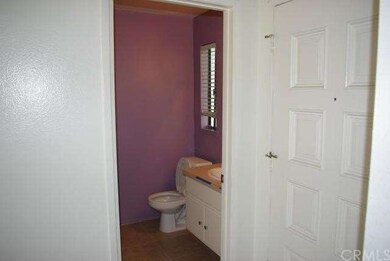Half Bath with laundry room inside at the entrance