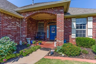 Entrance to property featuring covered porch and a