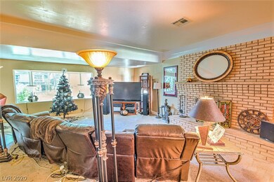 Downstairs living room with fireplace